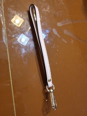 Michael Kors Pale Pink Leather Wrist Strap with Gold Hardware
